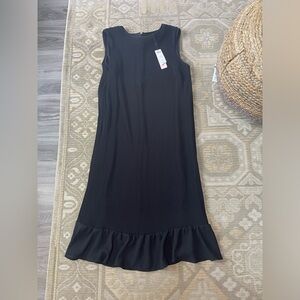 Elegant Black Shift dress with ruffle hem . NWT size 10